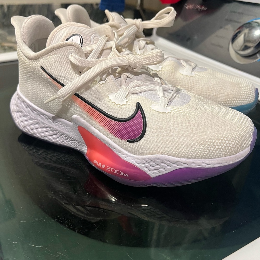Nike women’s White and Pink Sneakers